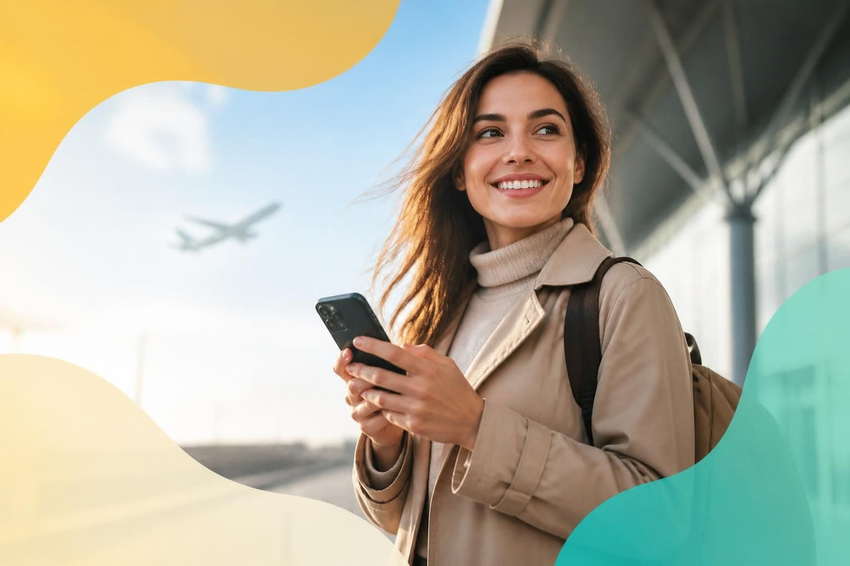 Traveller switching on an eSIM line on a smartphone in an airport arrivals hall after landing