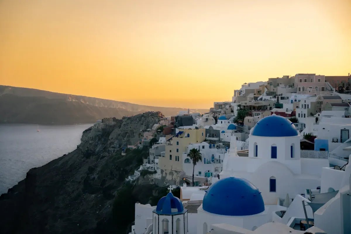 Blue domes of Santorini at sunset